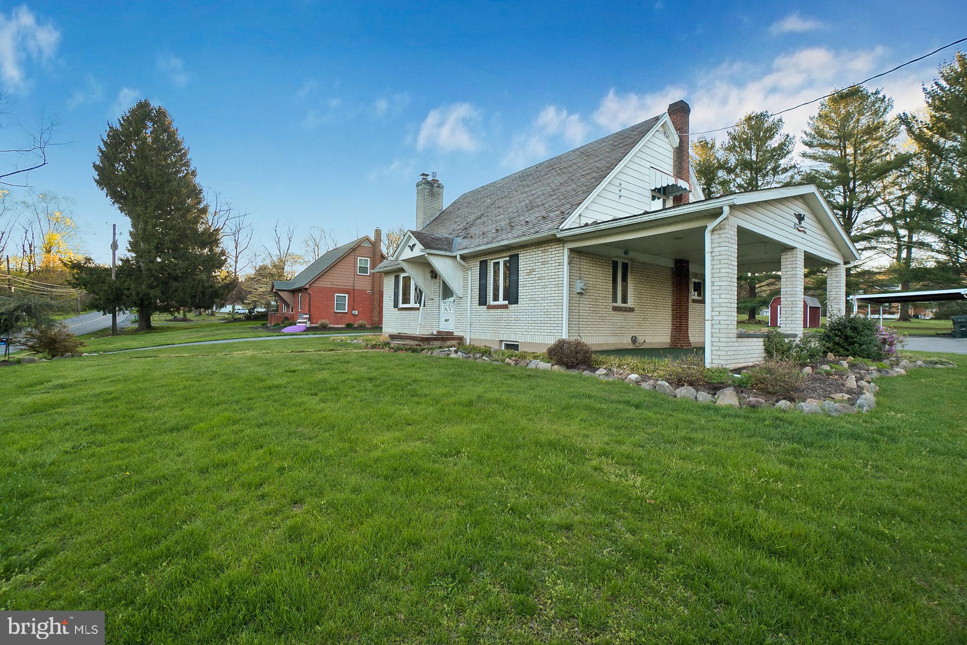2627 Welshtown Road Slatington, PA 18080 - Photo 28 of 32 a front view of house with yard and green space