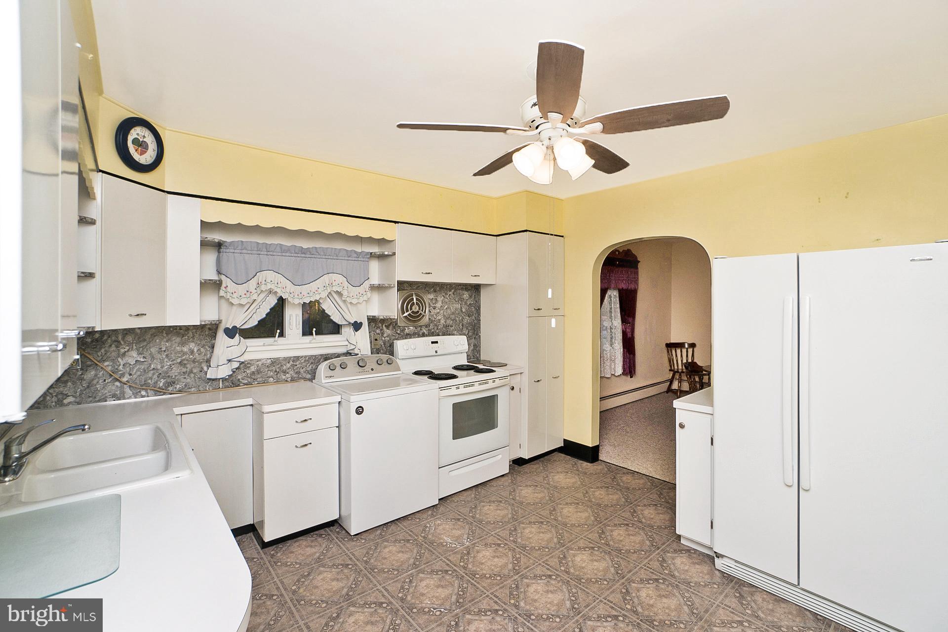 2627 Welshtown Road Slatington, PA 18080 - Photo 6 of 32 a kitchen with stainless steel appliances a sink and cabinets