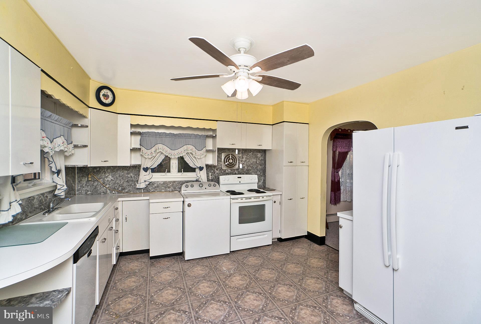 2627 Welshtown Road Slatington, PA 18080 - Photo 7 of 32 a kitchen with a refrigerator and a sink