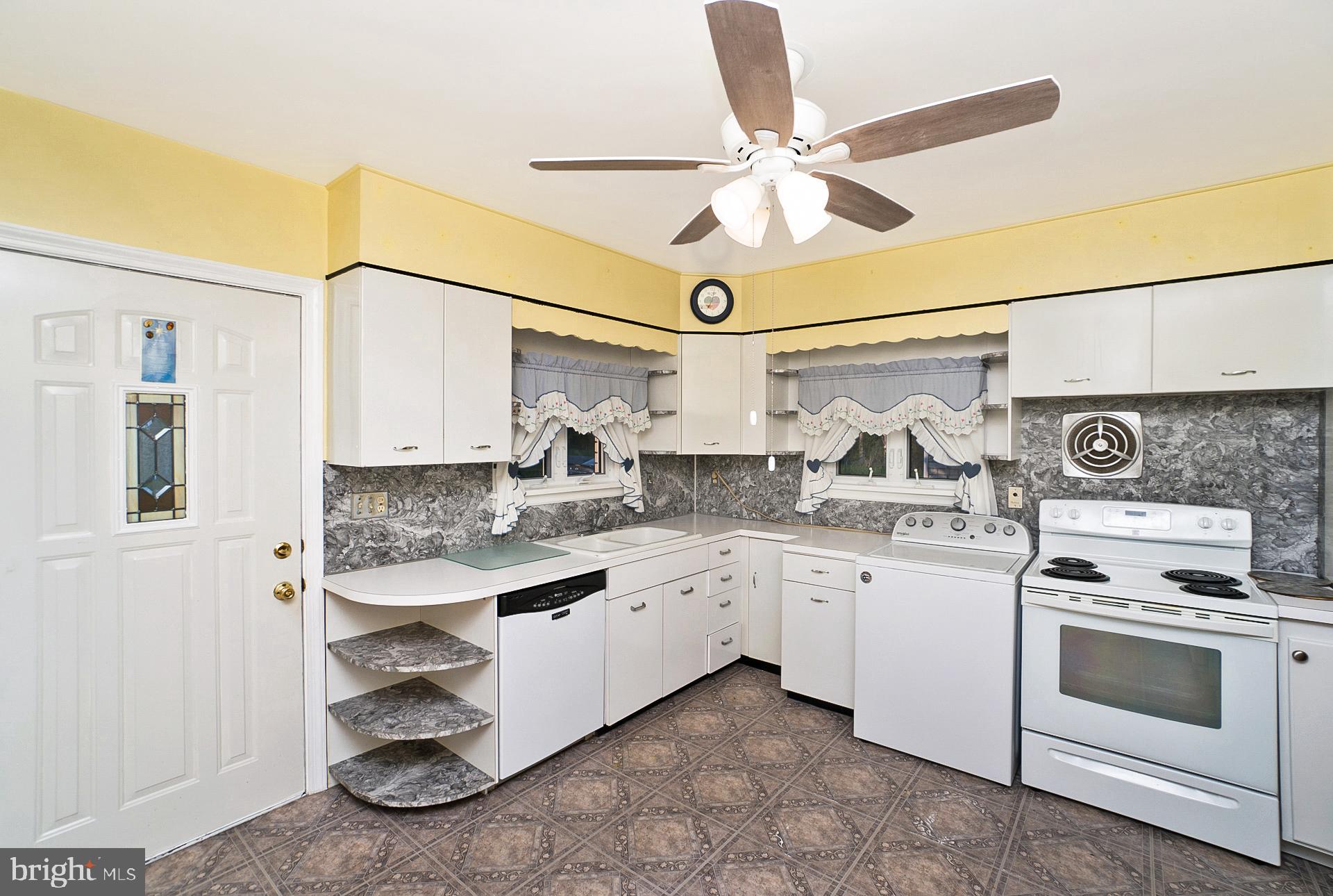 2627 Welshtown Road Slatington, PA 18080 - Photo 8 of 32 a kitchen with a sink cabinets and window
