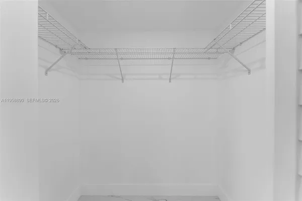 a view of a room with racks on the wall