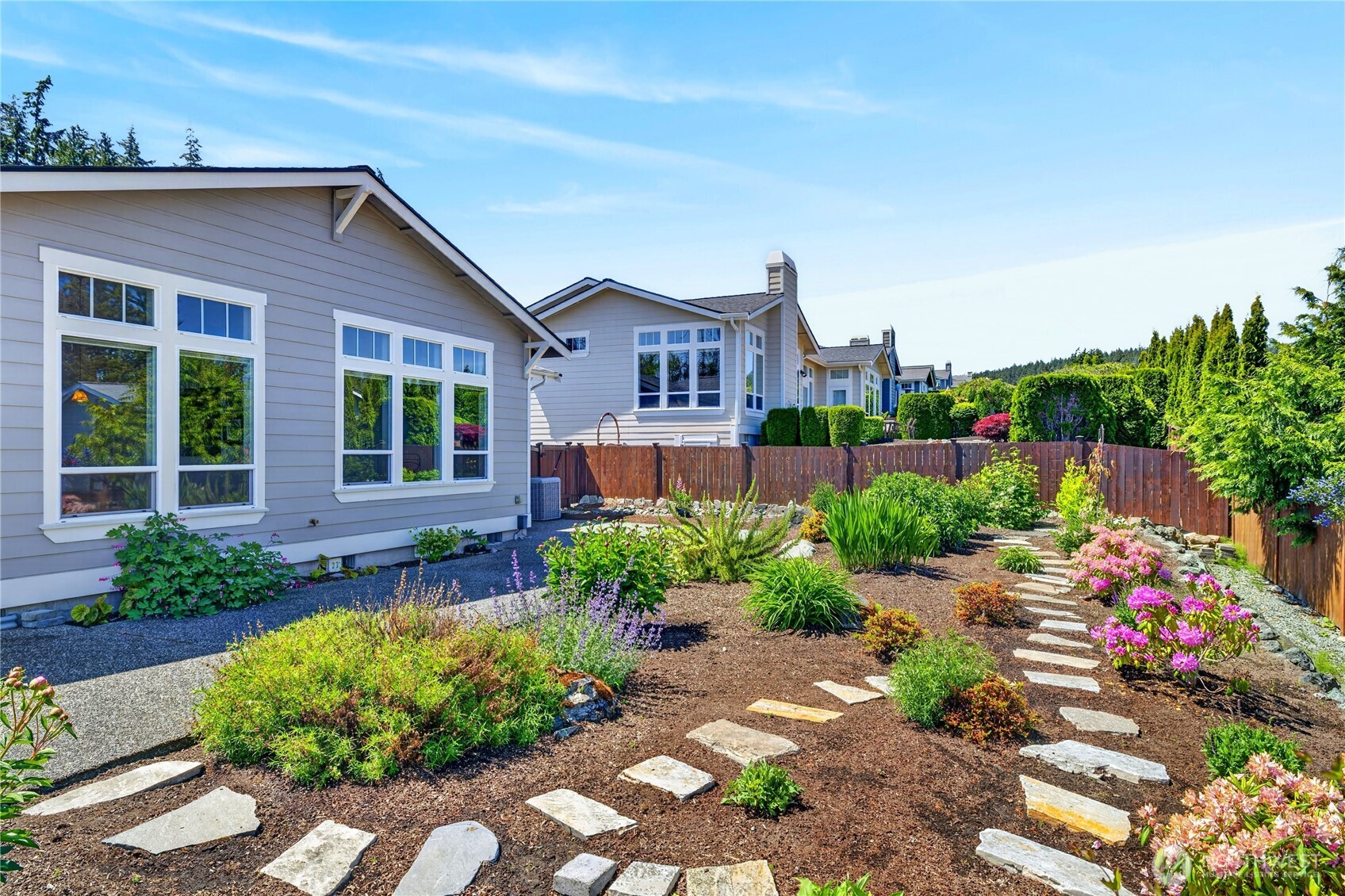 1908 29th Place Anacortes, WA 98221 - Photo 38 of 40 a front view of a house with a yard