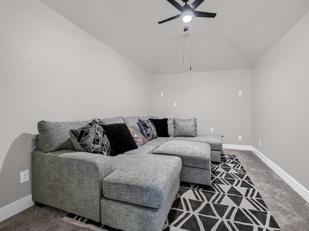 6221 Muller Creek Drive Pilot Point, TX 76258 - Photo 26 of 40 a living room with furniture and a ceiling fan