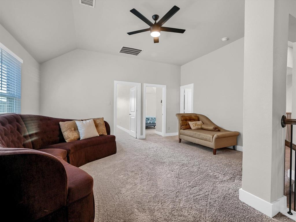 6221 Muller Creek Drive Pilot Point, TX 76258 - Photo 27 of 40 a living room with furniture and a ceiling fan