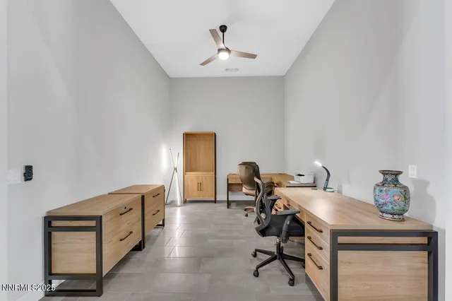 a view of a workspace with furniture