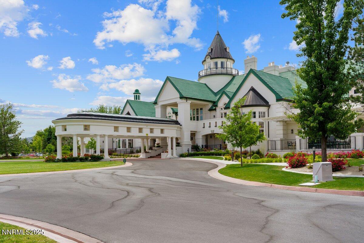 6119 South Pleasant Oak Trail Reno, NV 89511 - Photo 37 of 44 a view of street with houses and trees in the background