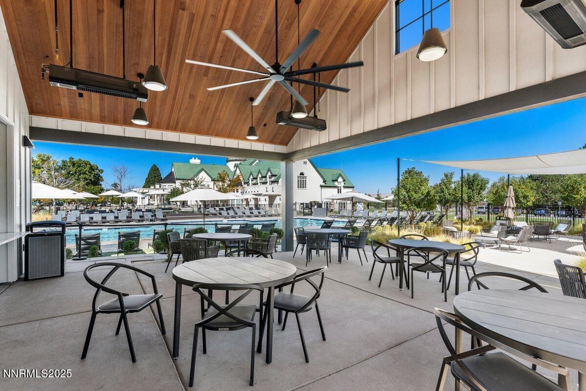 6119 South Pleasant Oak Trail Reno, NV 89511 - Photo 38 of 44 a dining room with furniture and window