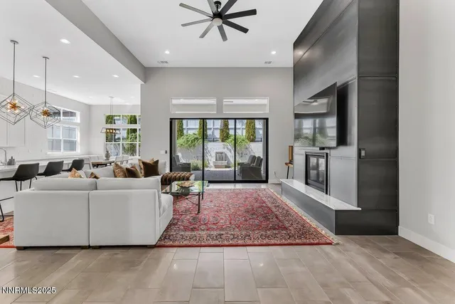 a living room with furniture and a rug