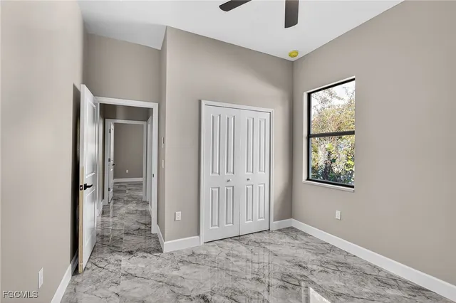 an empty room with closet