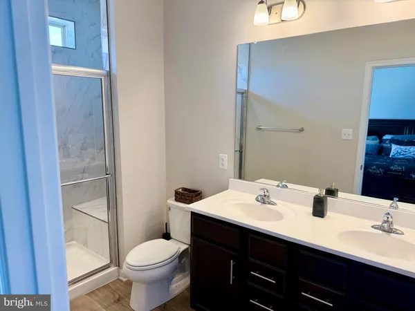 a bathroom with a sink and a toilet