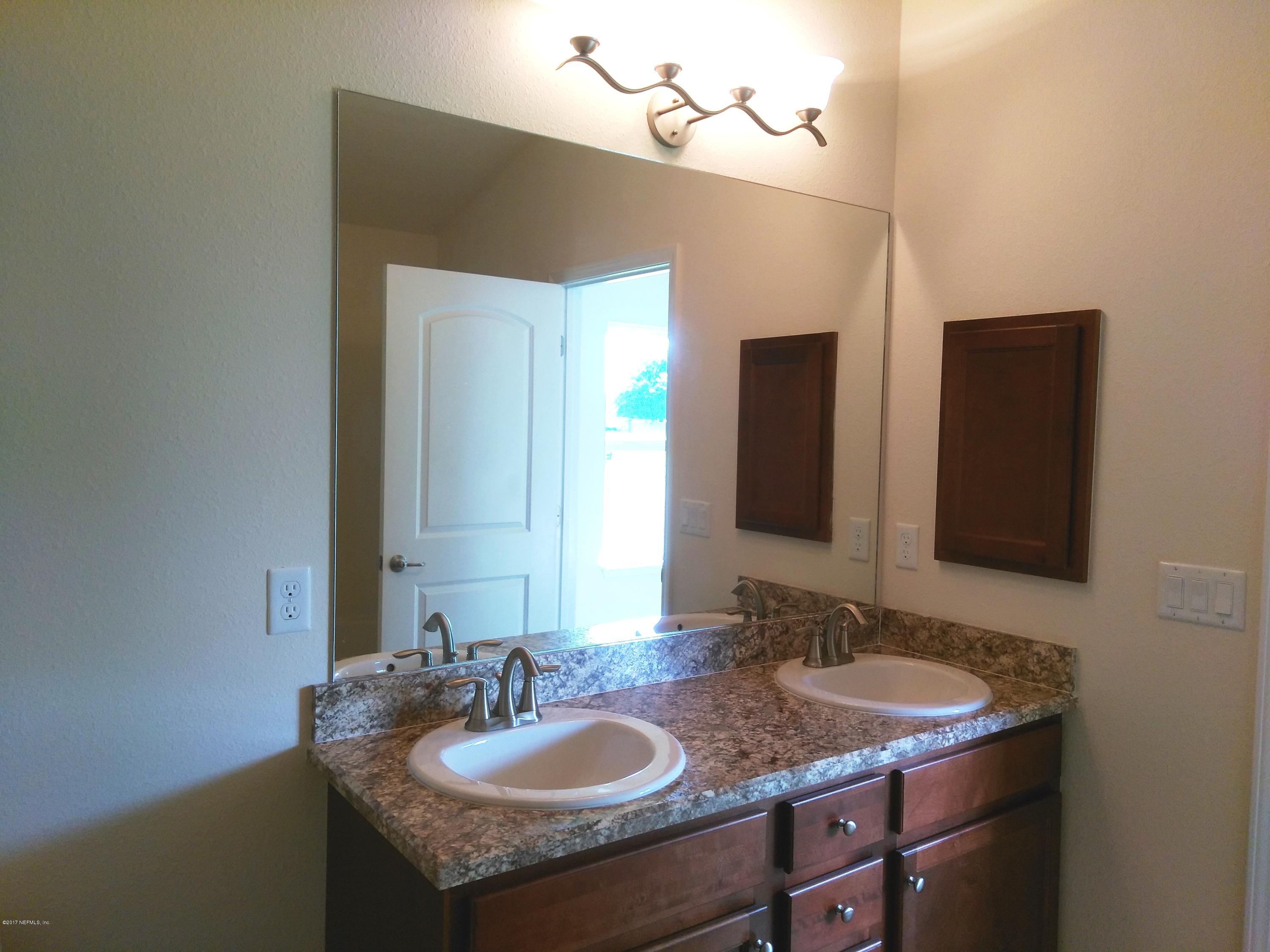 78091 Saddle Rock Road Yulee, FL 32097 - Photo 6 of 26 1940 Owner's Bath