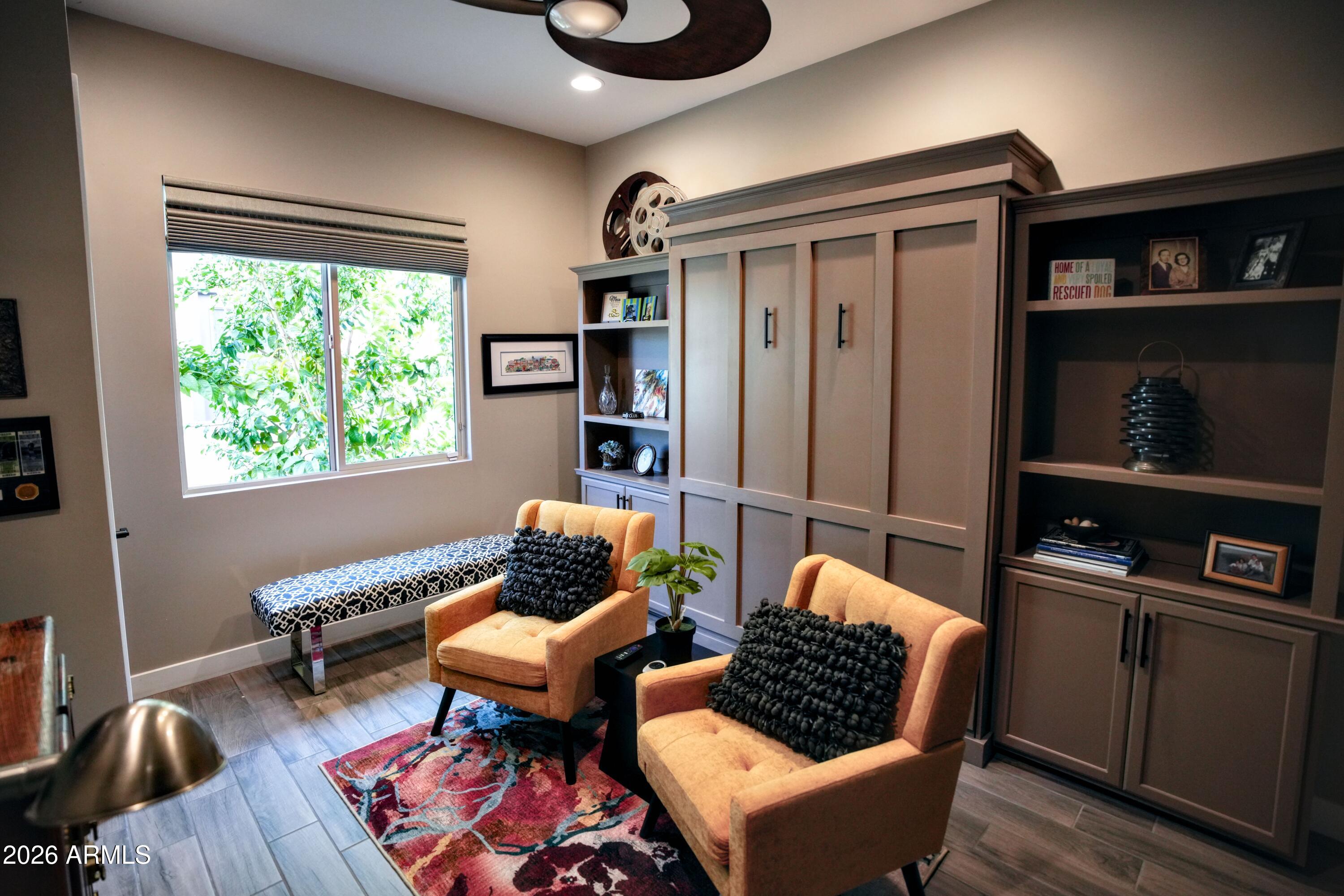 20471 West Coolidge Street Buckeye, AZ 85396 - Photo 34 of 41 a living room with furniture and a window