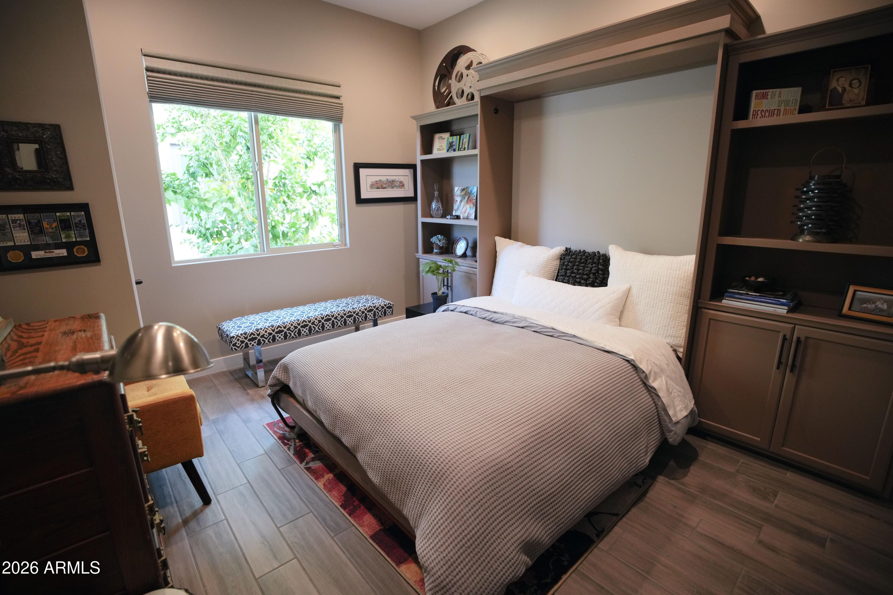 20471 West Coolidge Street Buckeye, AZ 85396 - Photo 35 of 41 a bedroom with a bed and a window