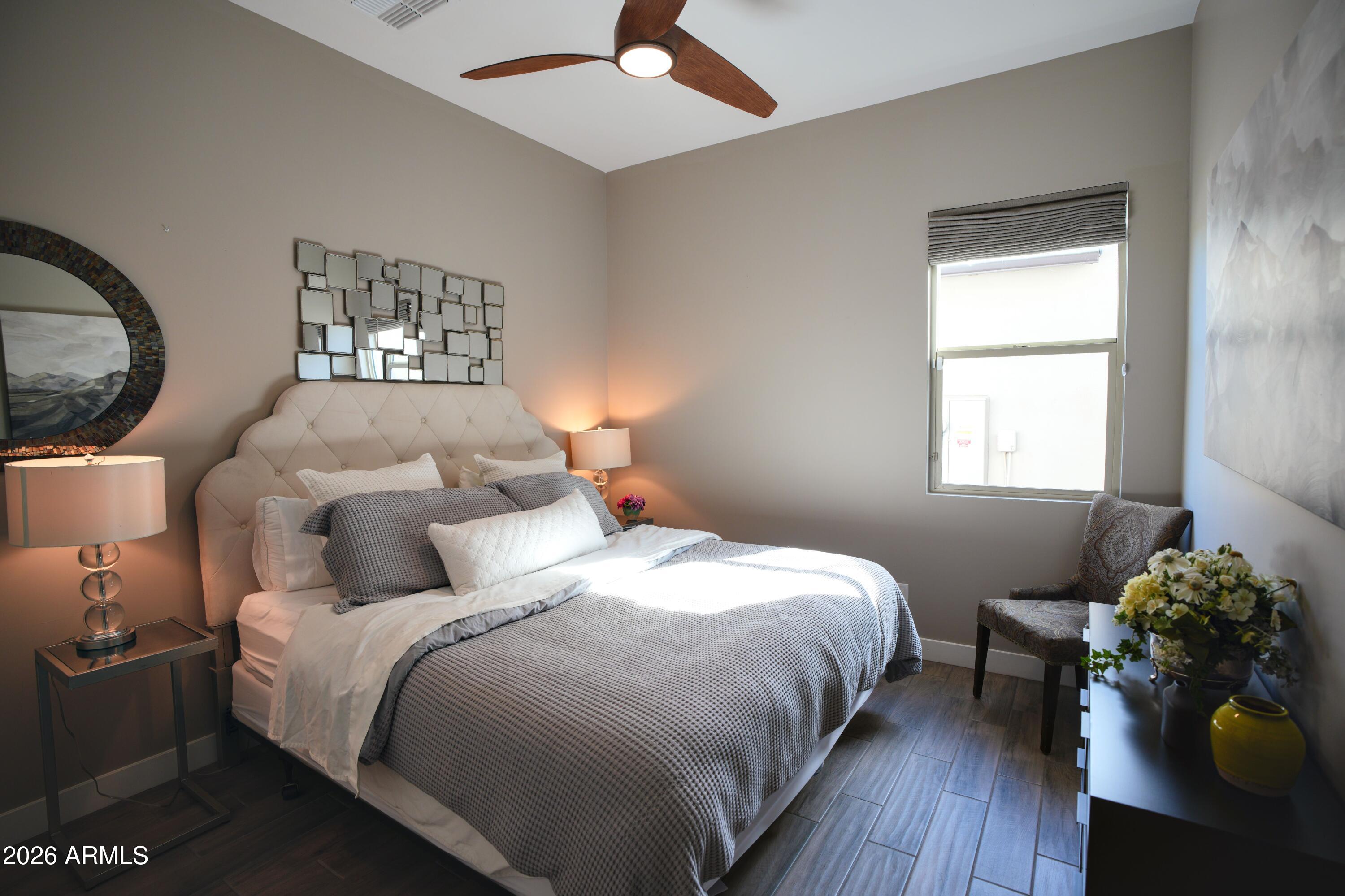 20471 West Coolidge Street Buckeye, AZ 85396 - Photo 39 of 41 a bedroom with bed and a window