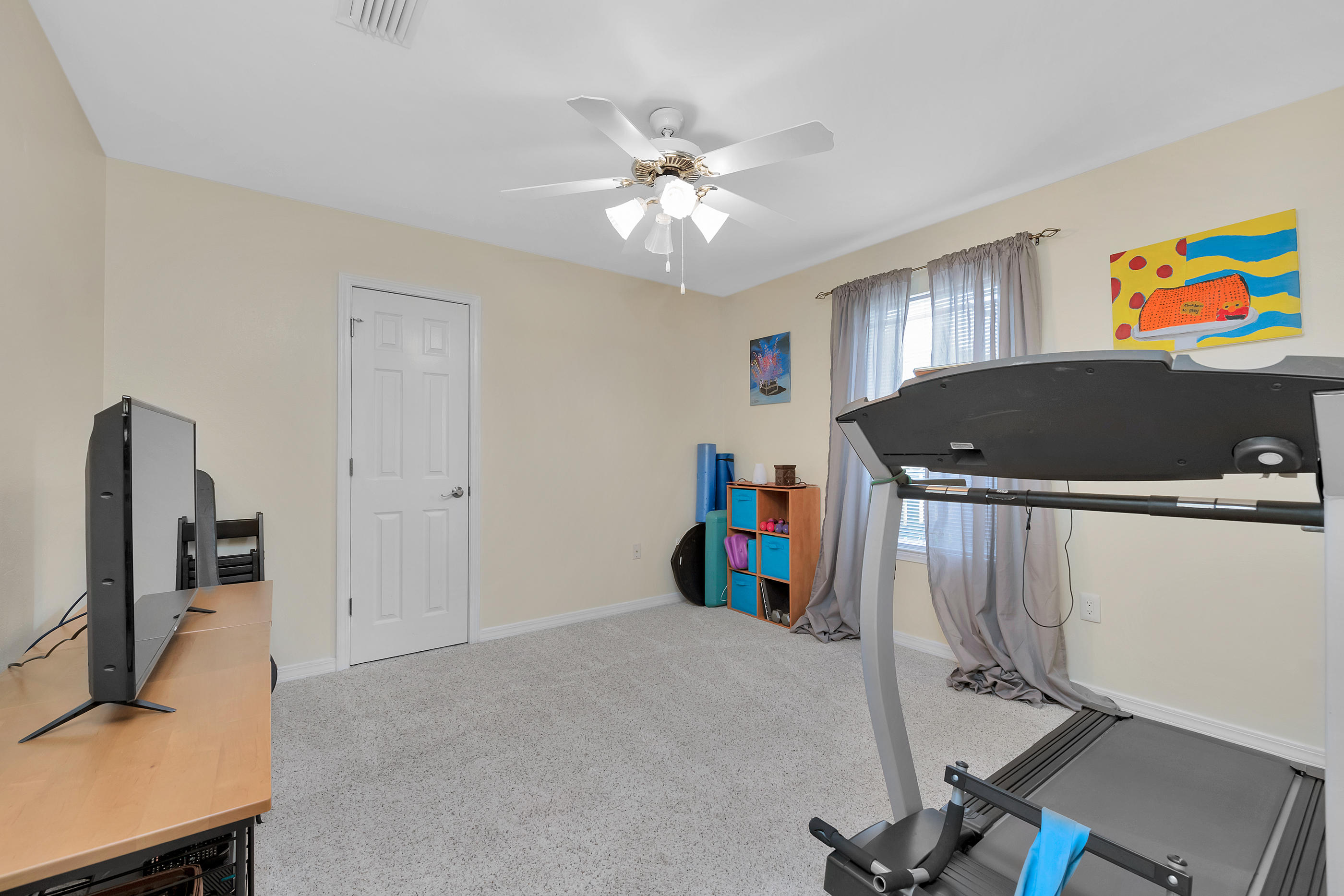 7159 Riverview Road Navarre, FL 32566 - Photo 27 of 36 a very nice looking room with a large window