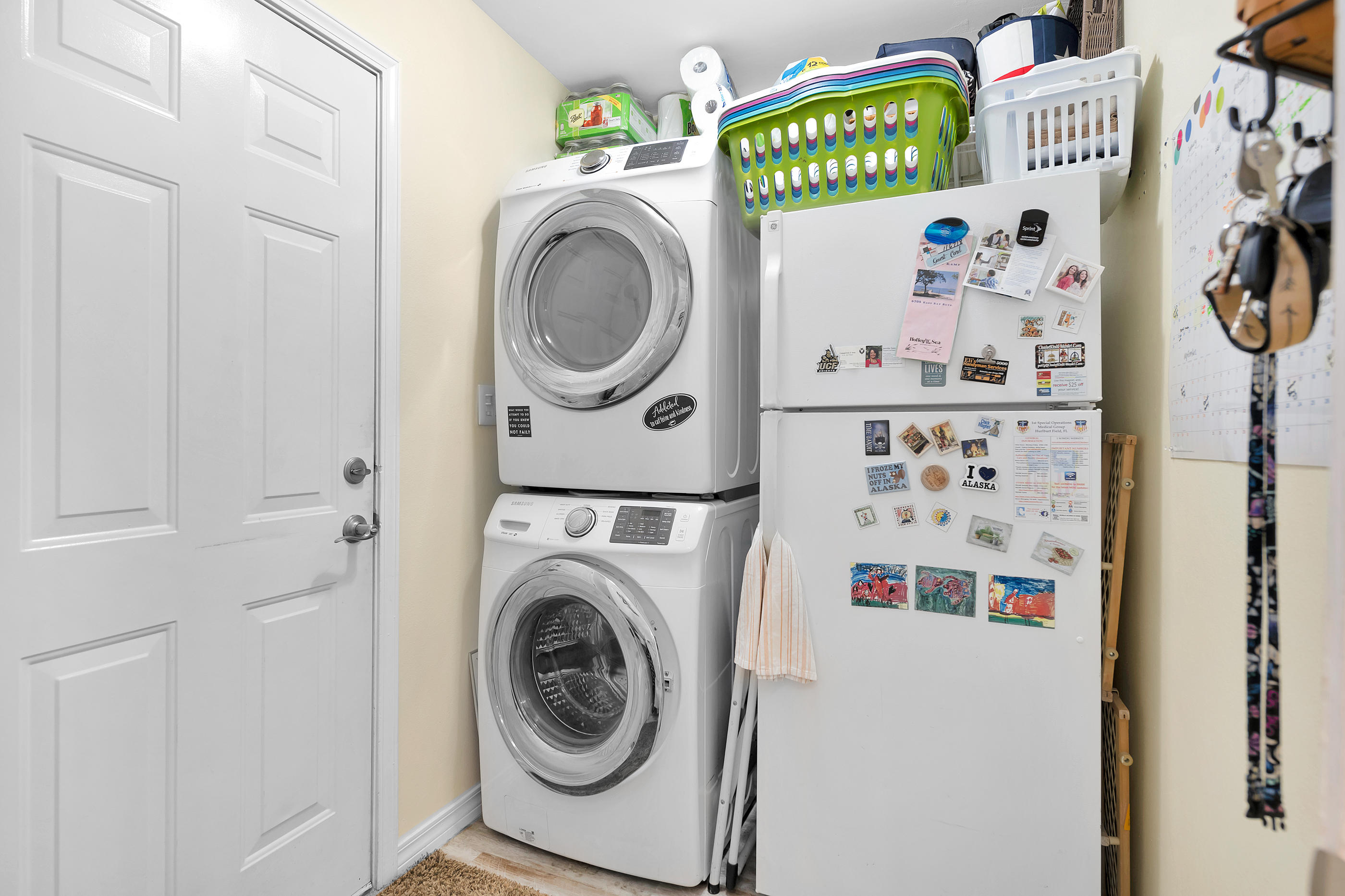 7159 Riverview Road Navarre, FL 32566 - Photo 36 of 36 a utility room with dryer and washer