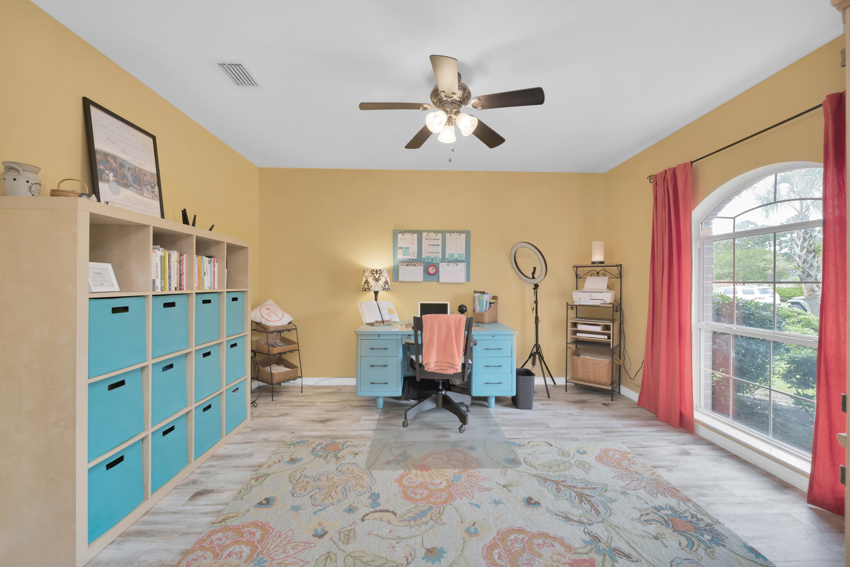 7159 Riverview Road Navarre, FL 32566 - Photo 5 of 36 a bedroom with furniture and a window
