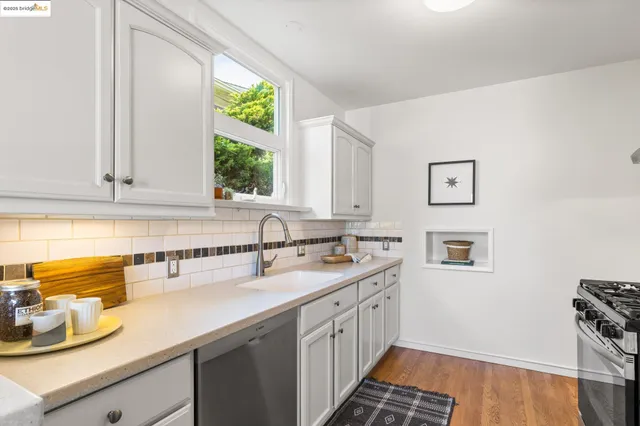 a kitchen with a sink and a window