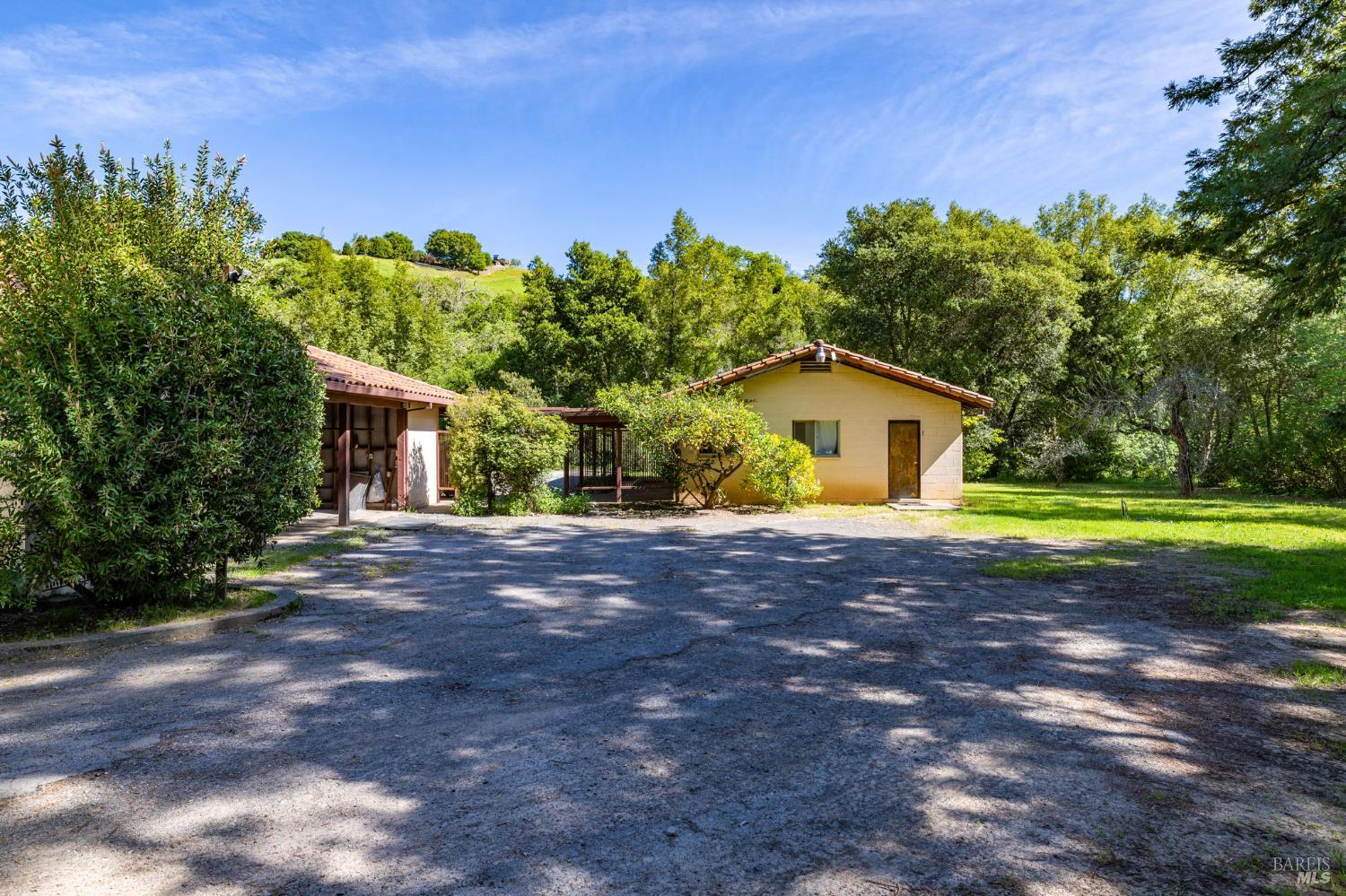 3320 Redwood Road Napa, CA 94558 - Photo 12 of 57 a view of a house with backyard and garden
