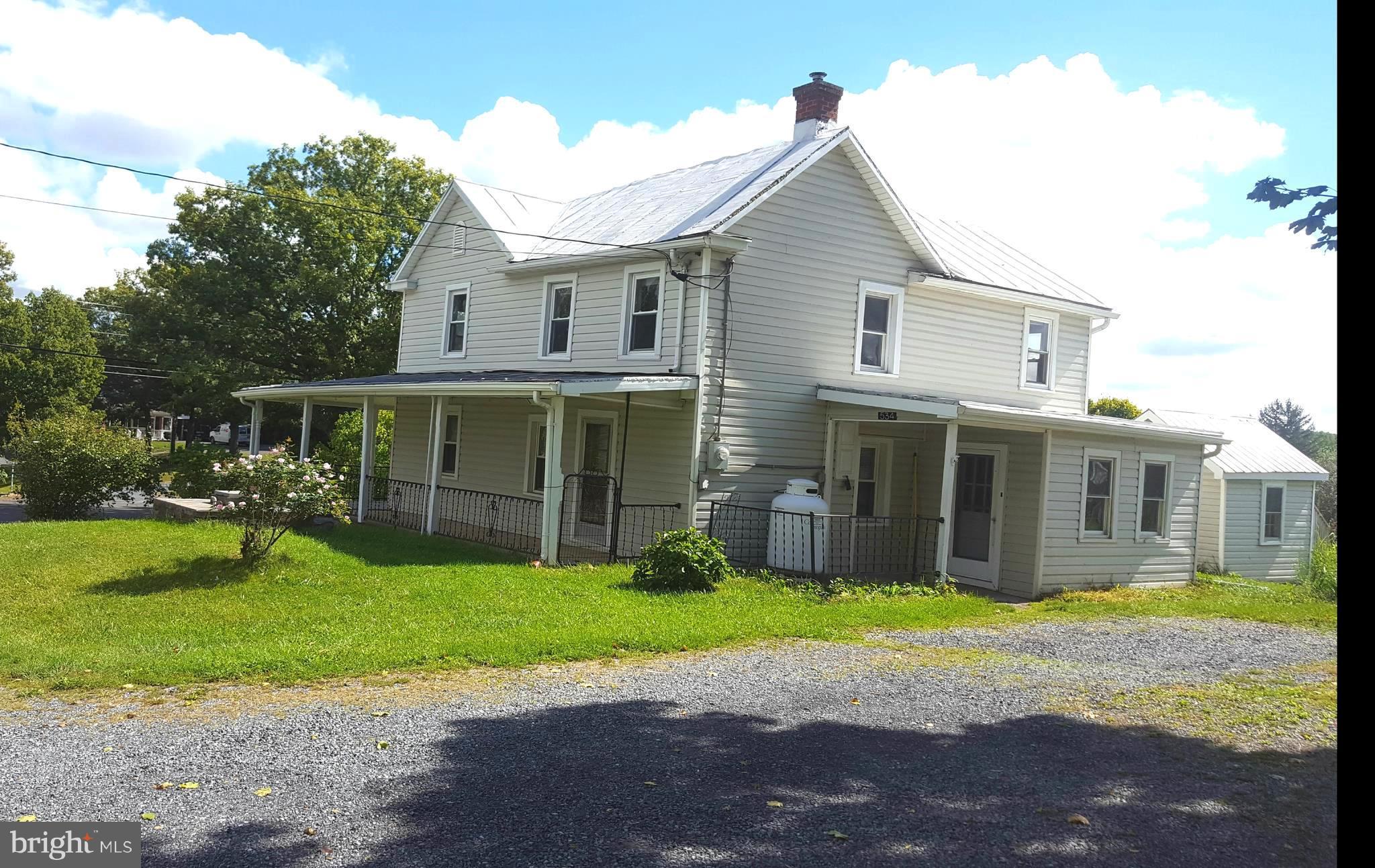 534 Punch Run Road Front Royal, VA 22630 - Photo 1 of 27 a view of a house with a yard and sitting area