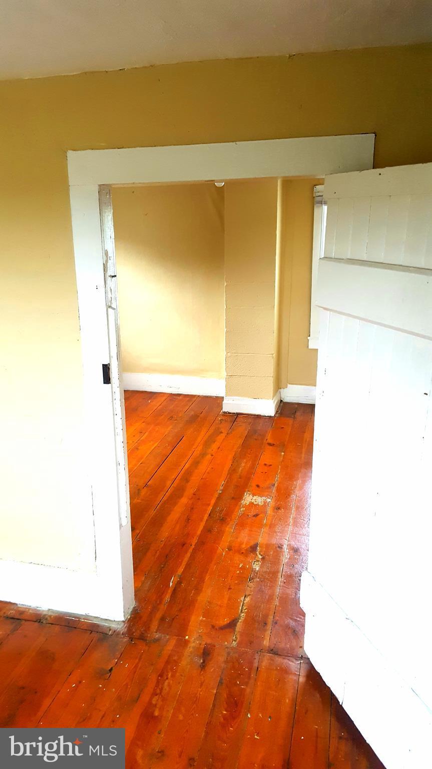 534 Punch Run Road Front Royal, VA 22630 - Photo 16 of 27 a view of a room with wooden floor