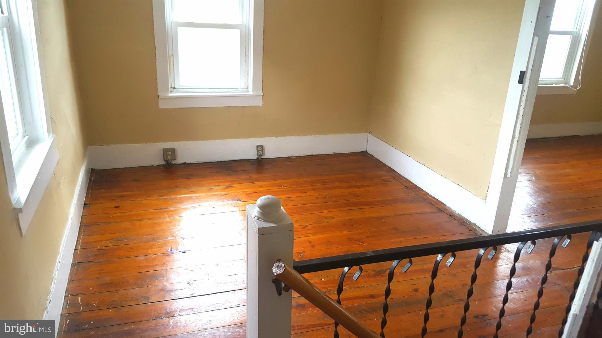 534 Punch Run Road Front Royal, VA 22630 - Photo 17 of 27 a view of a balcony with wooden floor