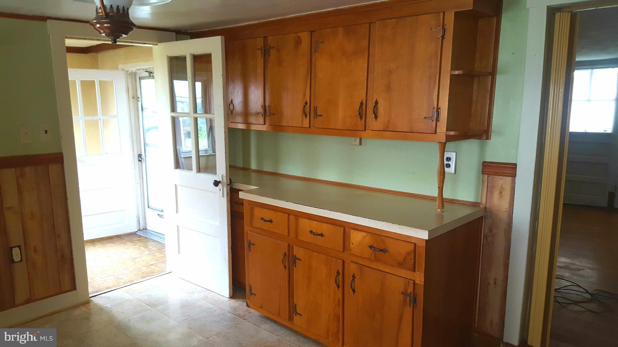 534 Punch Run Road Front Royal, VA 22630 - Photo 21 of 27 a kitchen with stainless steel appliances granite countertop a refrigerator and a sink