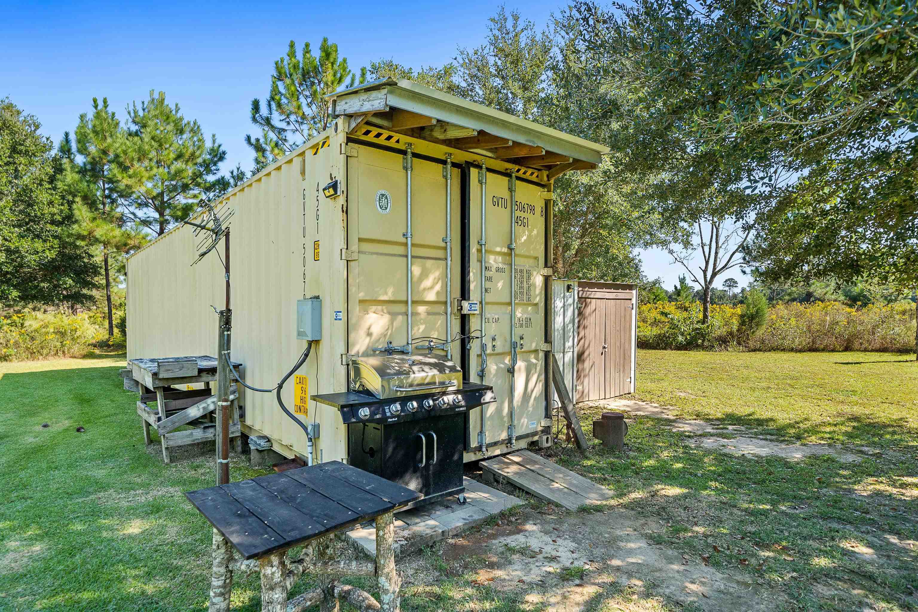 24616 Bretz Lane Elberta, AL 36530 - Photo 40 of 42 Shipping container set up for storage or workshop.