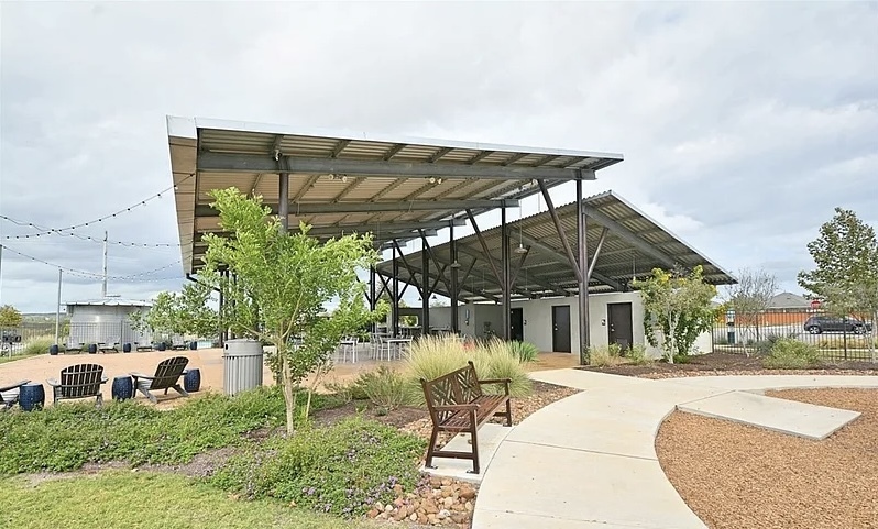 404 Spiny Lizard Lane San Marcos, TX 78666 - Photo 25 of 28 a view of a house with backyard porch and sitting area