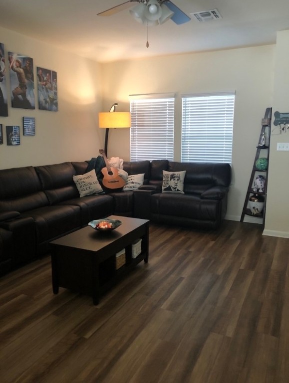 404 Spiny Lizard Lane San Marcos, TX 78666 - Photo 3 of 28 a living room with furniture and a wooden floor