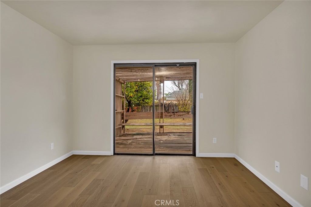 358 Sycamore Avenue Gustine, CA 95322 - Photo 22 of 37 an empty room with sliding door
