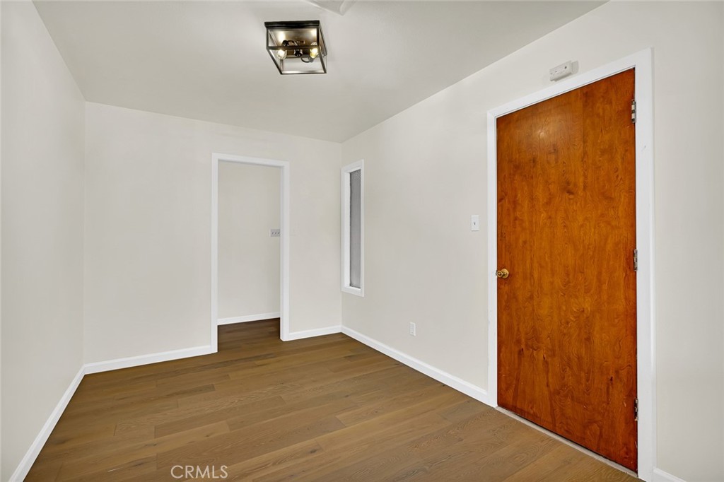 358 Sycamore Avenue Gustine, CA 95322 - Photo 26 of 37 a view of empty room with wooden floor