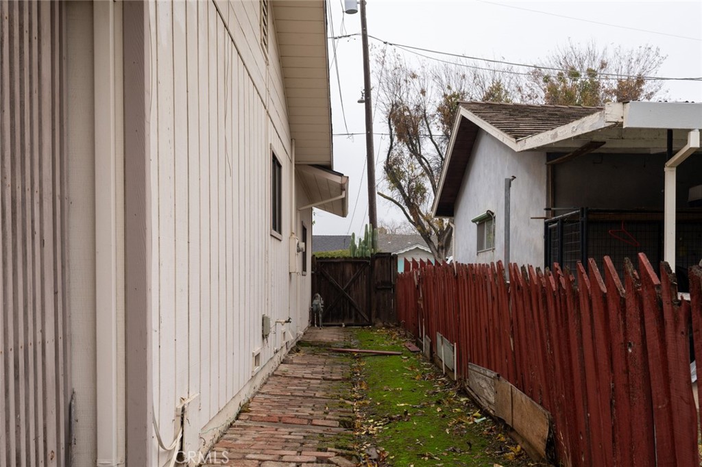 358 Sycamore Avenue Gustine, CA 95322 - Photo 36 of 37 a view of a house with wooden fence