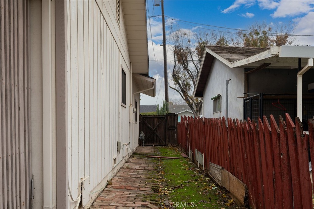 358 Sycamore Avenue Gustine, CA 95322 - Photo 37 of 37 a view of a house with wooden fence