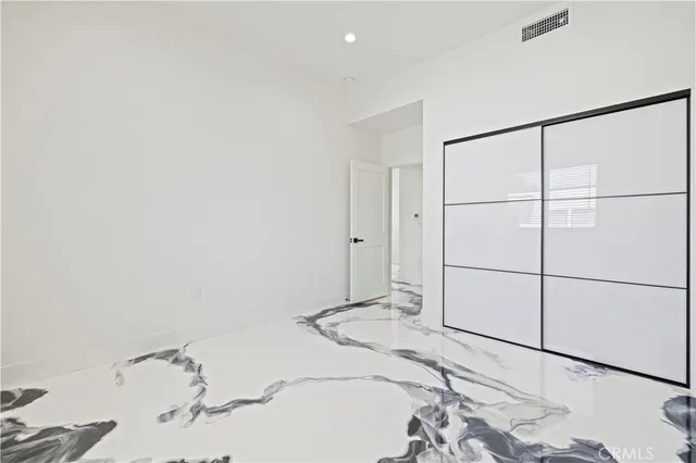 a bathroom with a sink vanity and a mirror