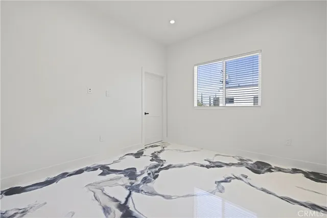 a bathroom with a double vanity sink toilet and shower