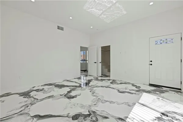 a bathroom with a sink and a window