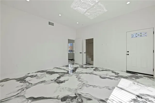 a bathroom with a sink and a window