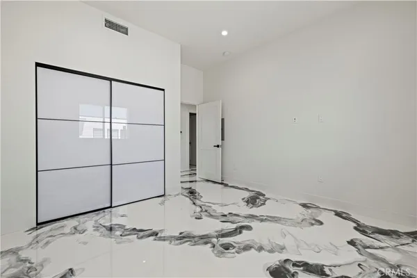 a view of front door with a mirror