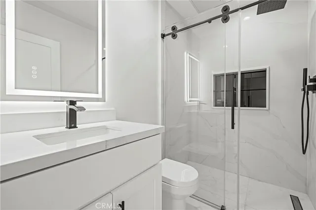 a bathroom with a sink and a window