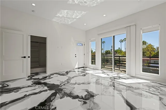a bathroom with a sink and a window