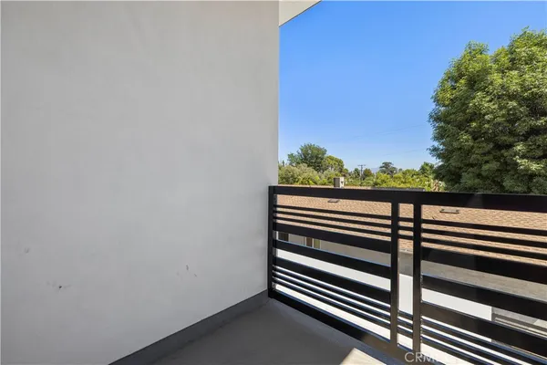 a bathroom with a sink toilet and mirror