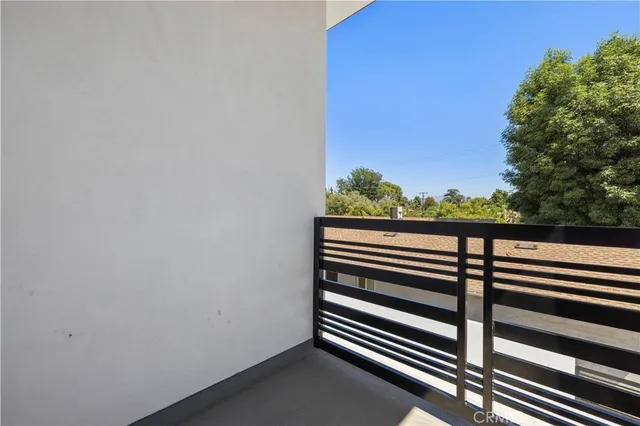 a bathroom with a sink toilet and mirror