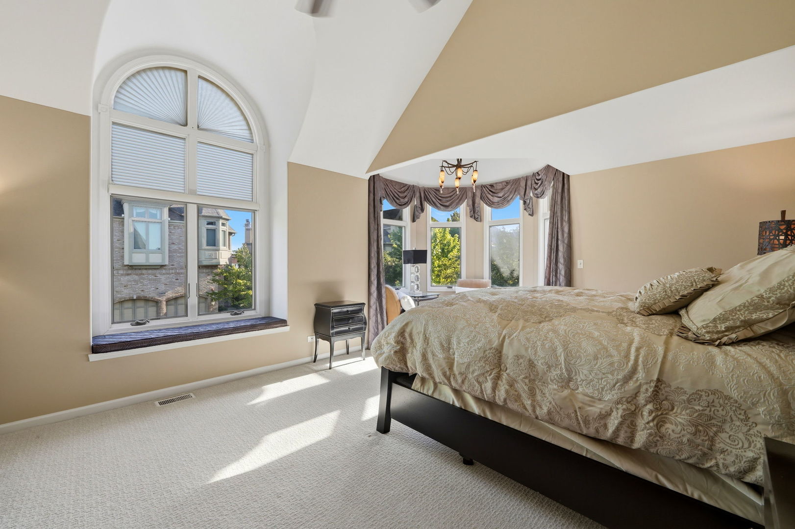 1406 Rue Paris Place Inverness, IL 60067 - Photo 22 of 35 a bed sitting in a spacious bedroom next to a window