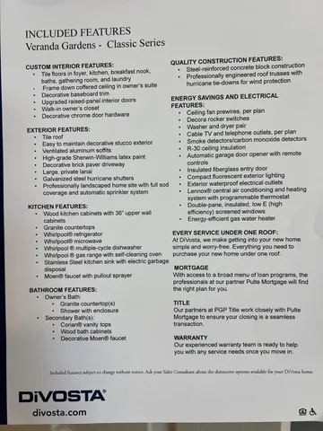 a kitchen with counter top space appliances and living room