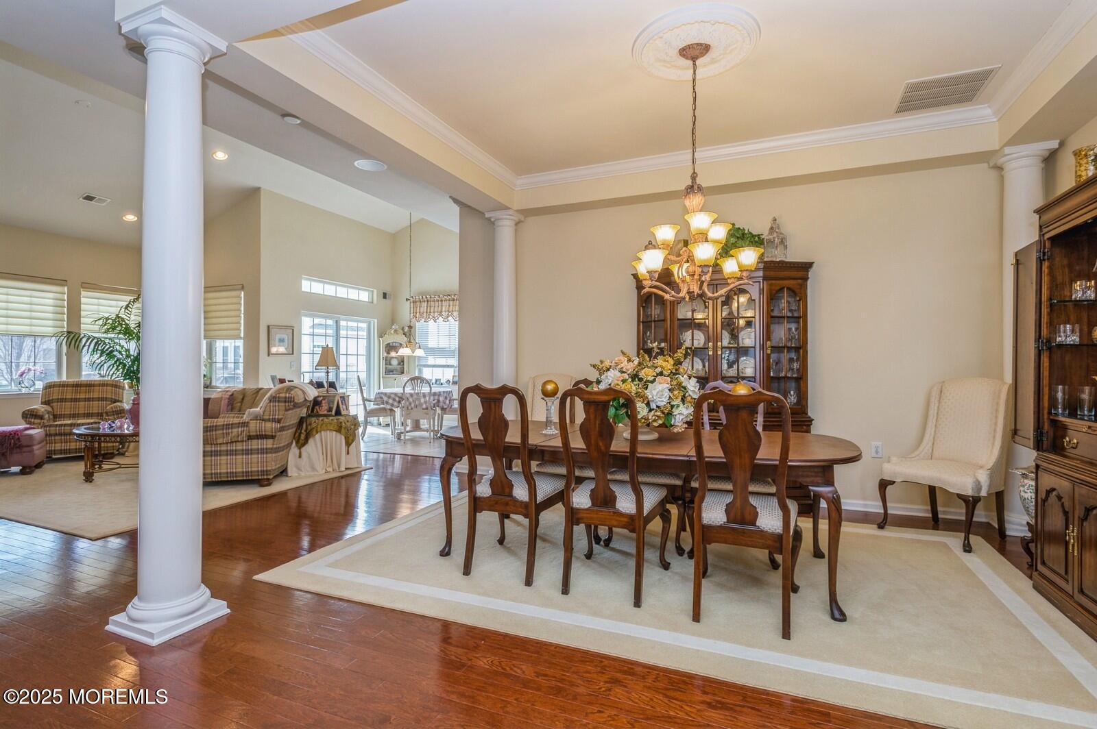 15 Eagleswood Drive Waretown, NJ 08758 - Photo 12 of 27 a view of a dining room with furniture window and wooden floor