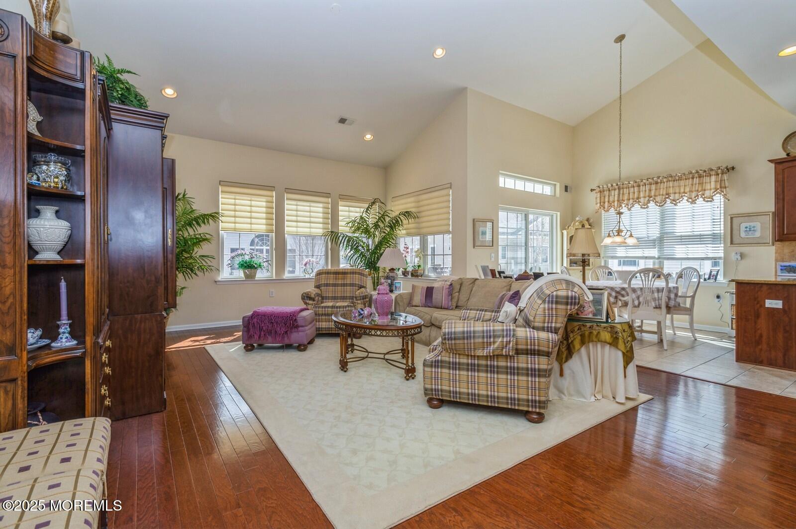 15 Eagleswood Drive Waretown, NJ 08758 - Photo 13 of 27 a living room with lots of furniture and a large window