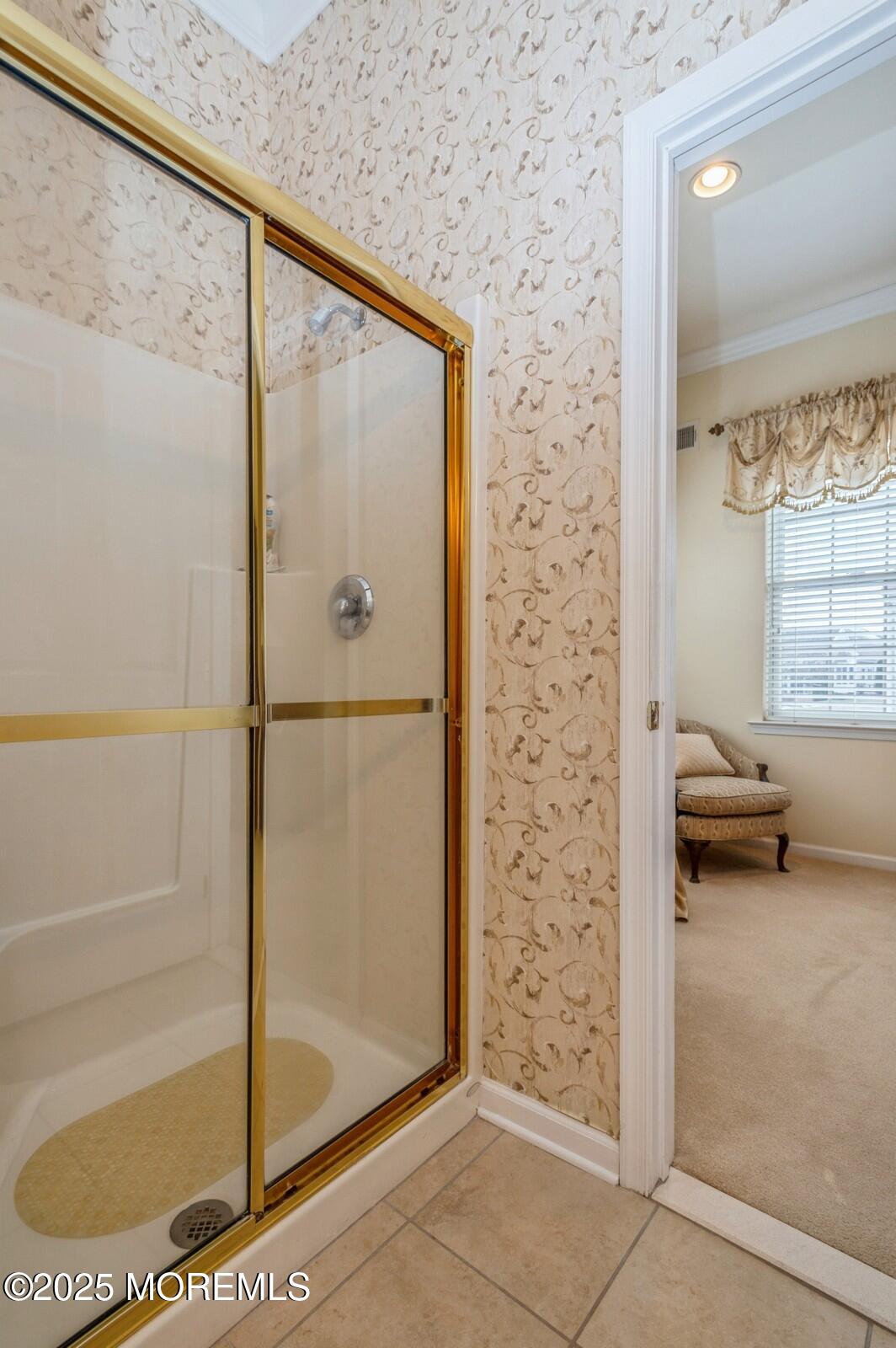 15 Eagleswood Drive Waretown, NJ 08758 - Photo 22 of 27 a bathroom with a glass shower door