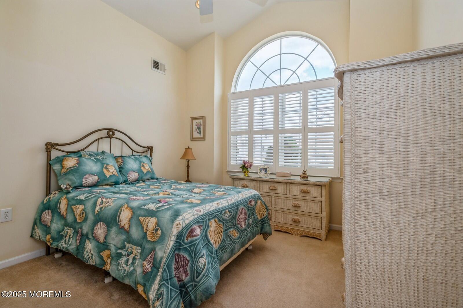 15 Eagleswood Drive Waretown, NJ 08758 - Photo 23 of 27 a bedroom with a bed and a window