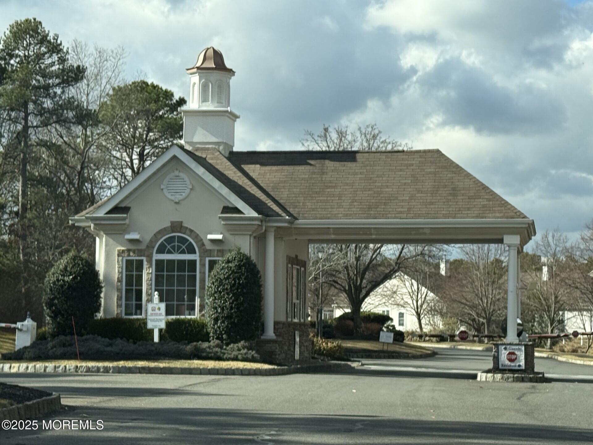 15 Eagleswood Drive Waretown, NJ 08758 - Photo 26 of 27 a front view of a house with a yard